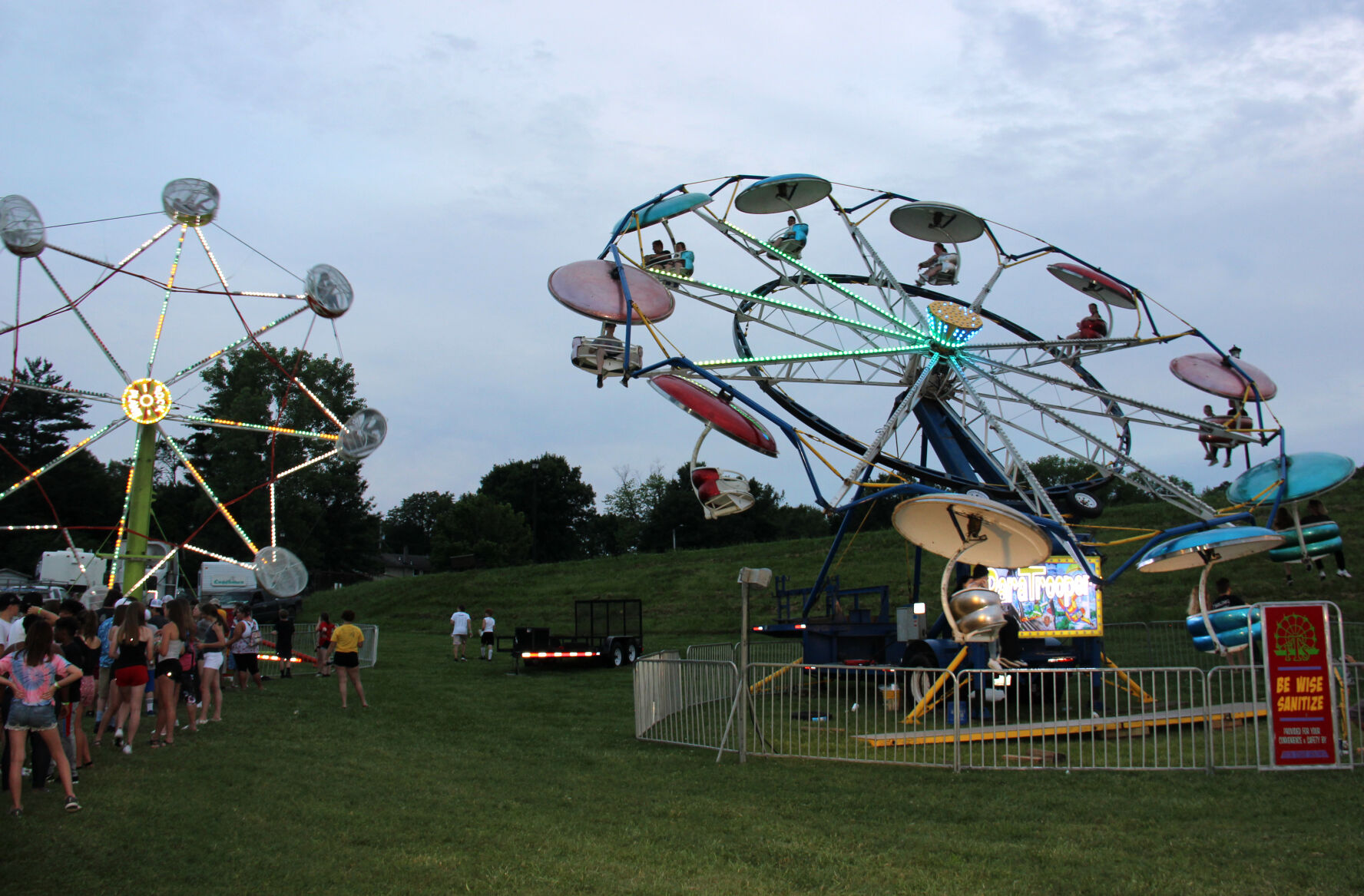 Rides light up at the fair